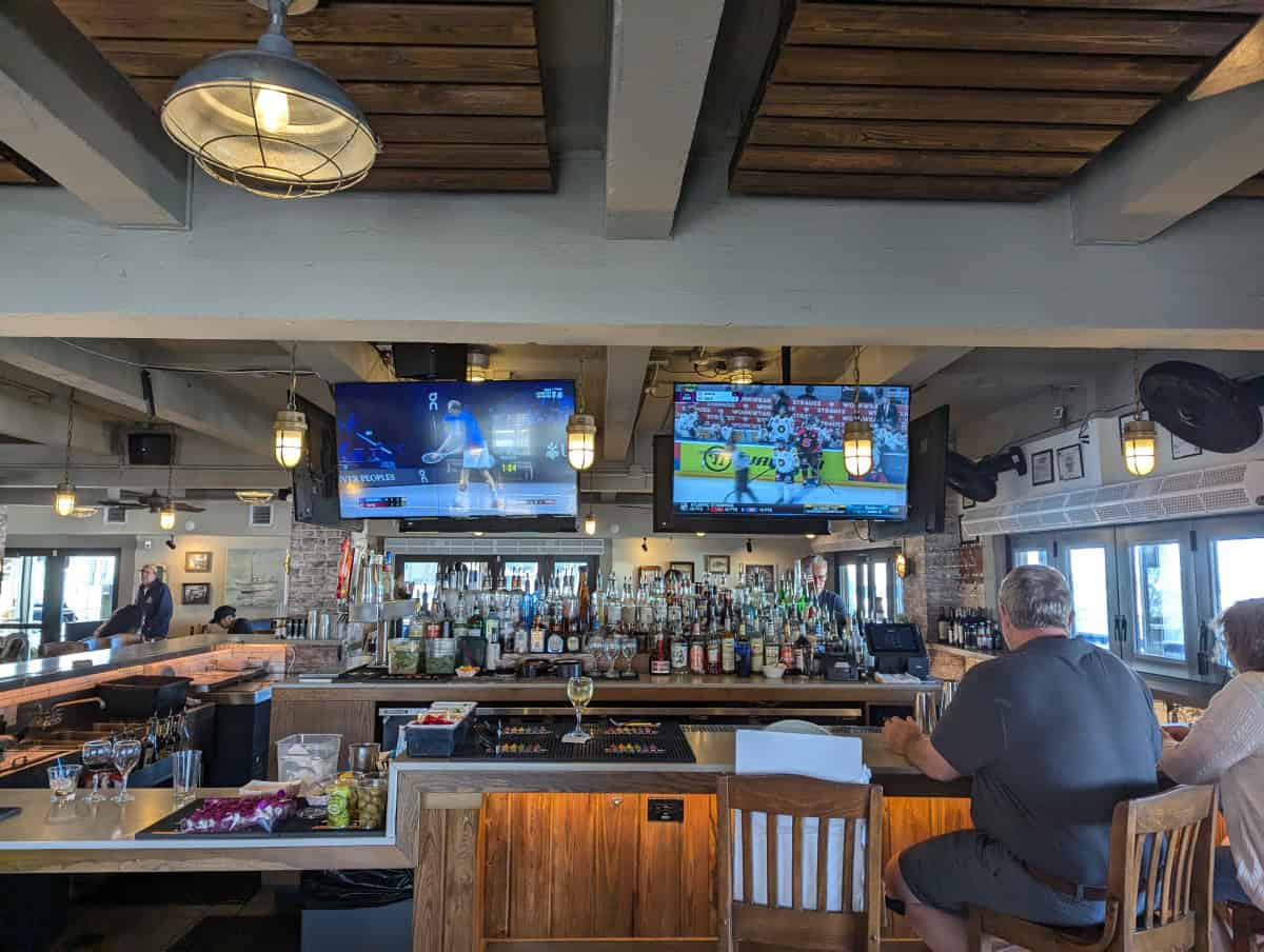 Alonzo's restaurant and Patio Bar are a few of the many sports bars in Key West. Bar and tv screens with sports on.