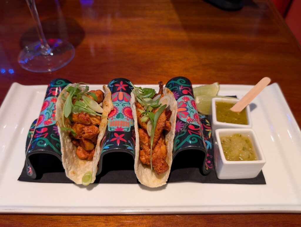 Chicken thigh pastor tacos with smoked pineapple and tomatillo salsas at Milagro in Key West