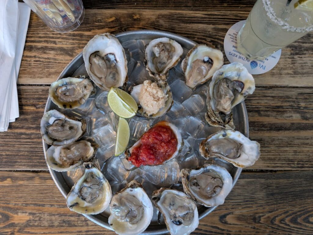 raw oysters on ice at Pepe's Cafe, cocktail sauce and horseradish served in shells