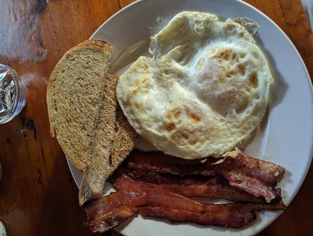 Breakfast at Pepe's Cafe Key West: eggs, bacon, and home fries
